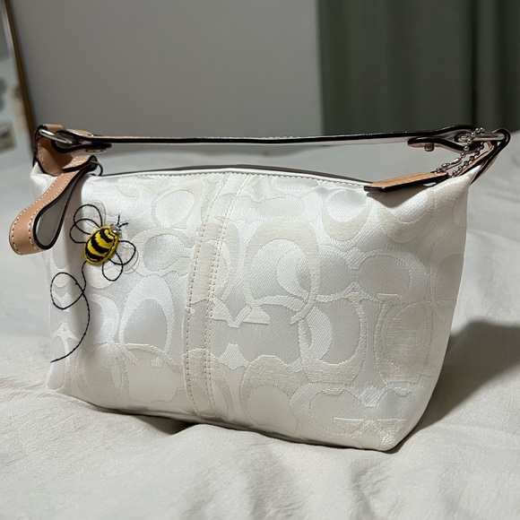 Coach Handbags - mini coach signature bumblebee demi pouch bag🐝✨